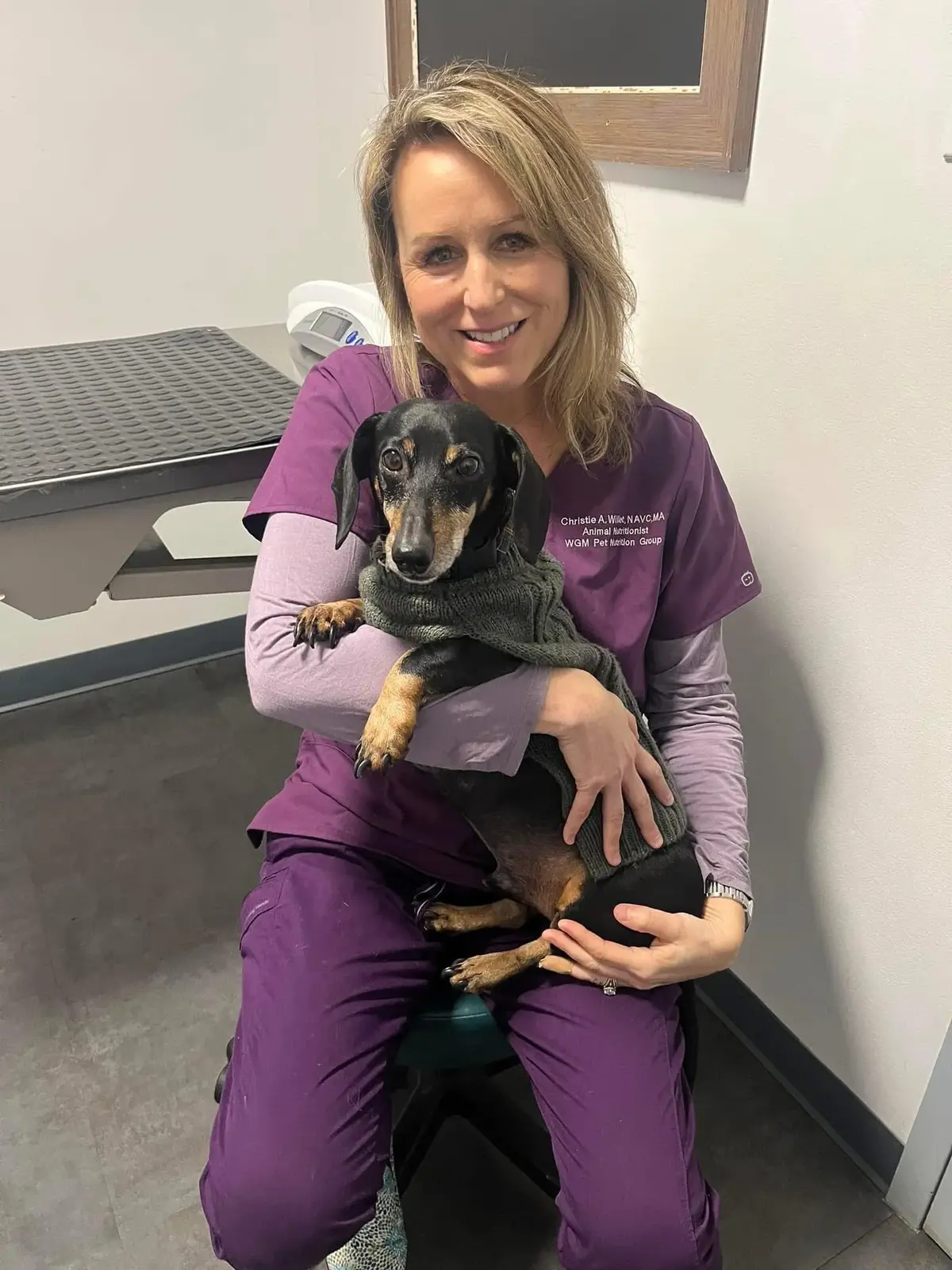 Christie with a client's dog